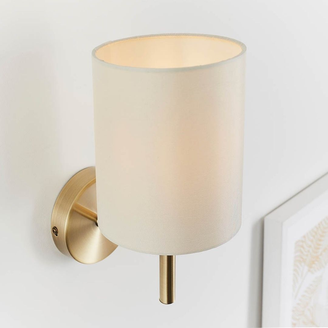 Brio Antique Brass Wall Light with Cream Shade