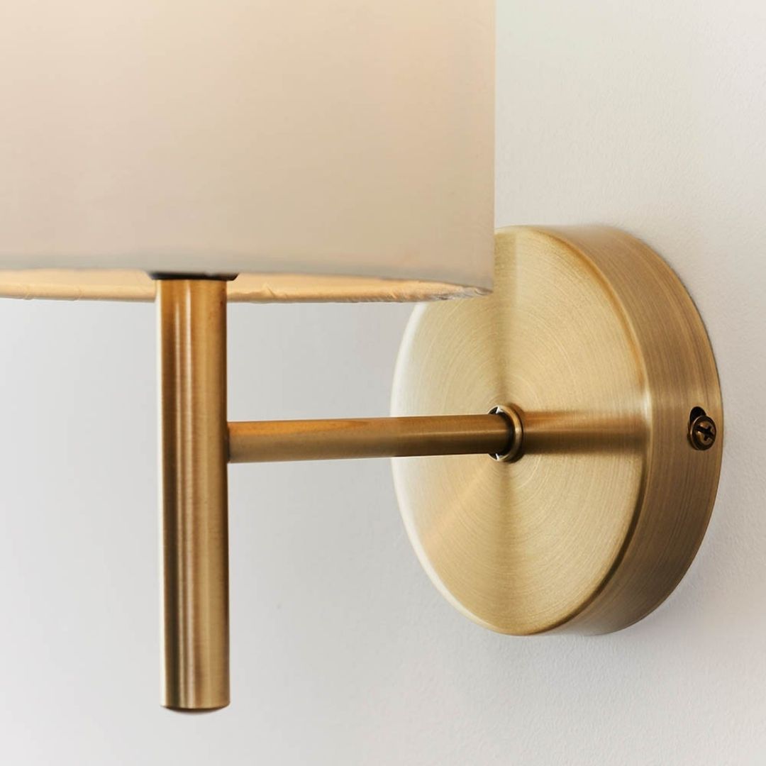 Brio Antique Brass Wall Light with Cream Shade