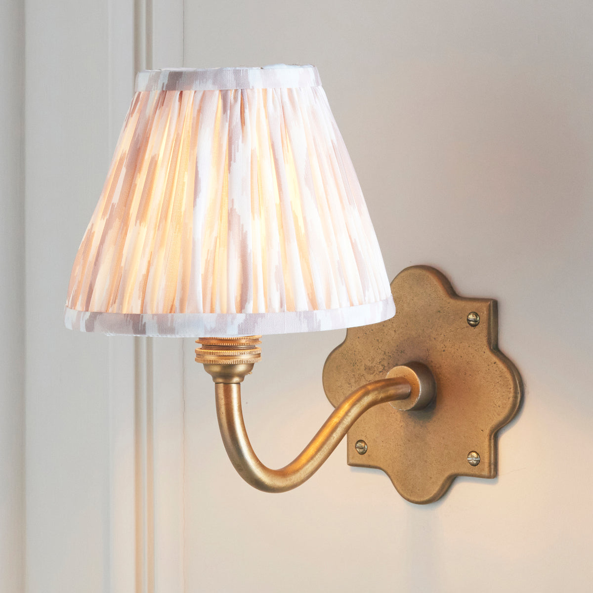 Anvil Curve Antique Brass Wall Light with Neutral Ikat Shade