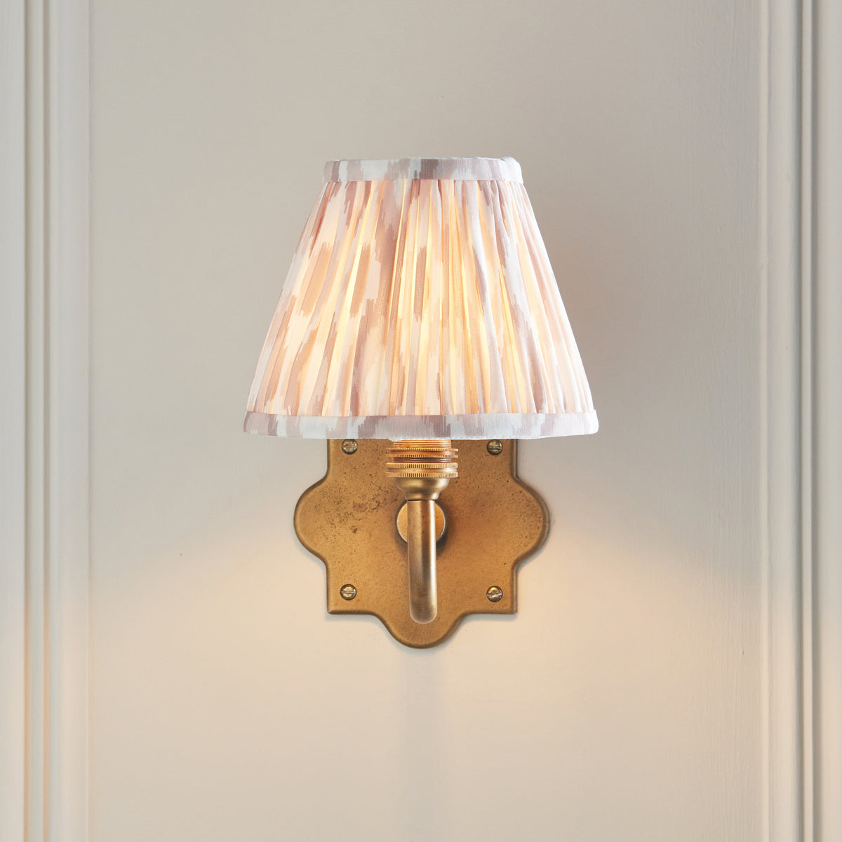 Anvil Curve Antique Brass Wall Light with Neutral Ikat Shade