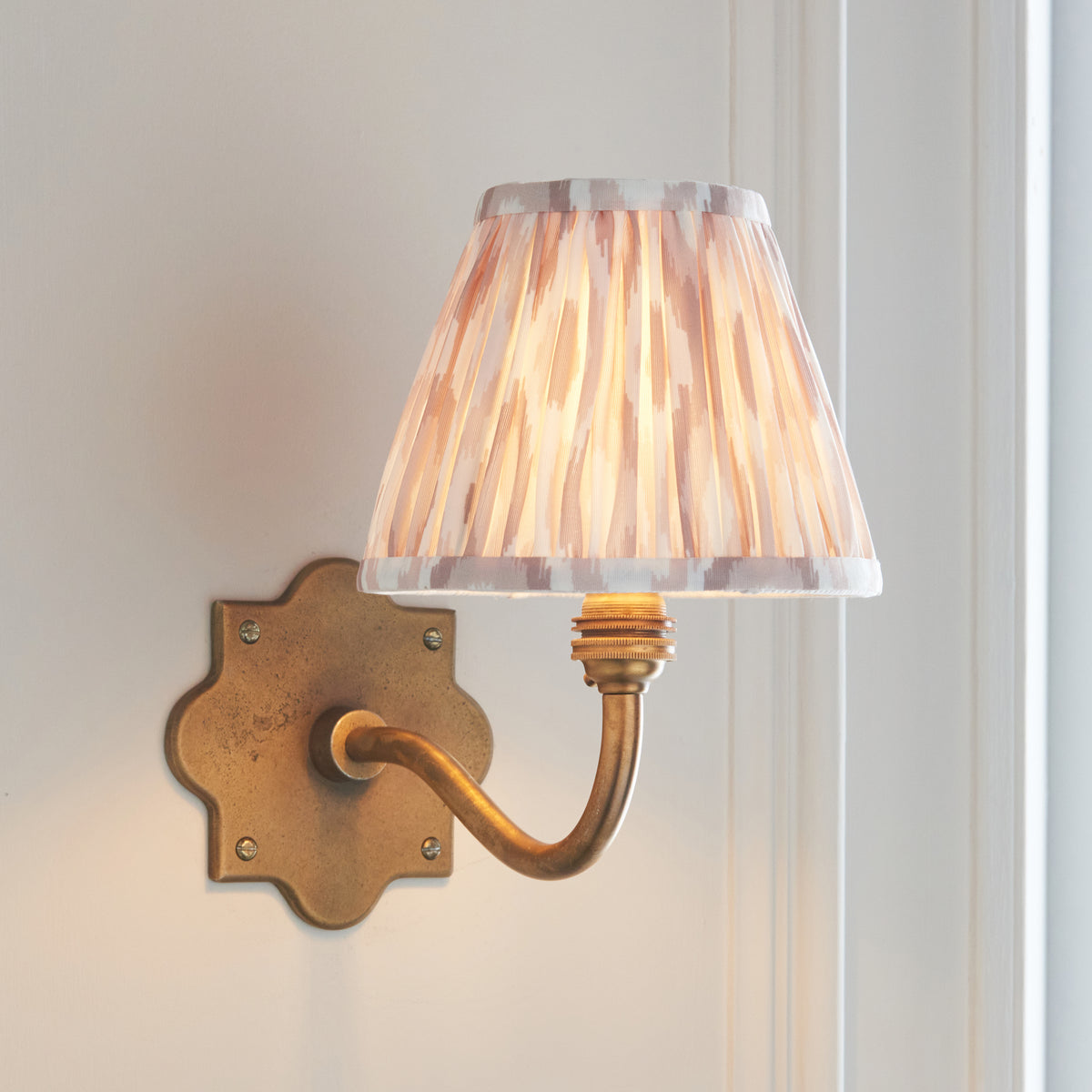 Anvil Curve Antique Brass Wall Light with Neutral Ikat Shade