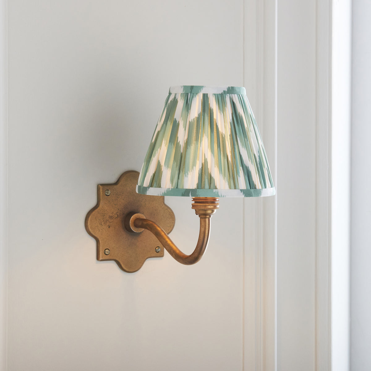 Anvil Curve Antique Brass Wall Light with Green Zigzag Shade