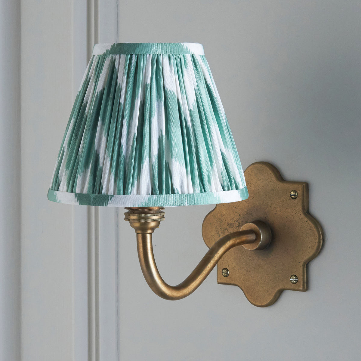Anvil Curve Antique Brass Wall Light with Green Zigzag Shade