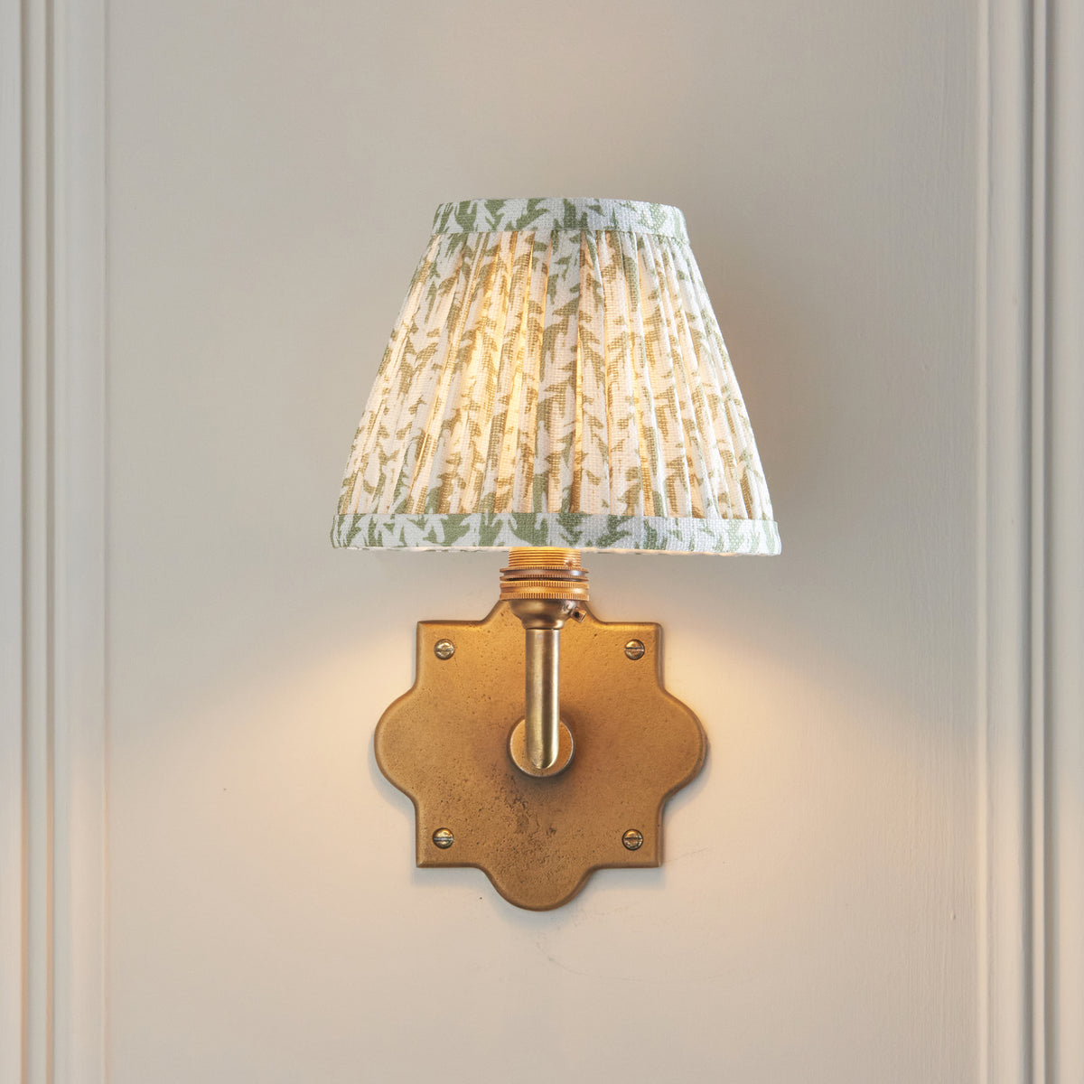 Anvil Angle Antique Brass Wall Light with Green Leaf Shade