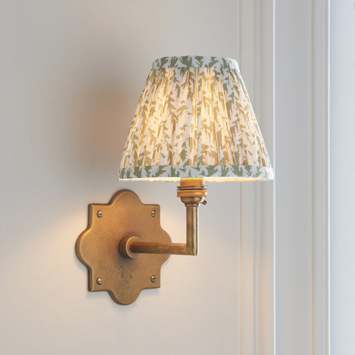 Anvil Angle Antique Brass Wall Light with Green Leaf Shade