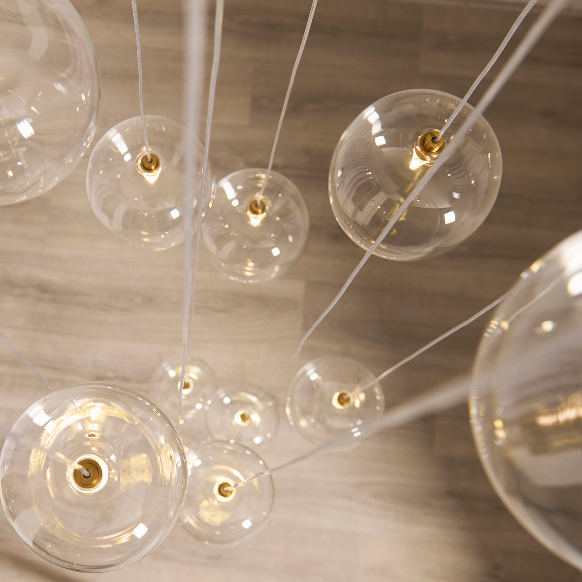 Oslo 12 Light Aged Brass & Clear Glass Cascade Pendant Light