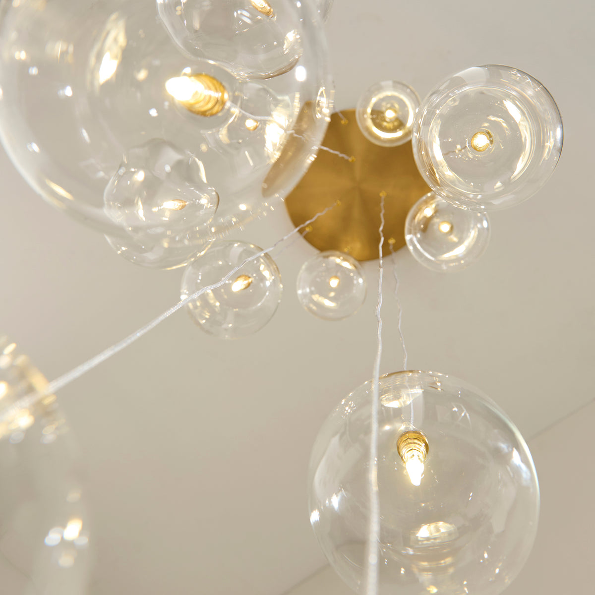 Oslo 12 Light Aged Brass & Clear Glass Cascade Pendant Light