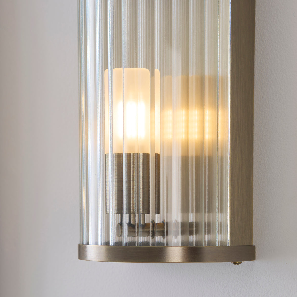 Ridgeton Antique Brass & Ribbed Glass Bathroom Wall Light IP44