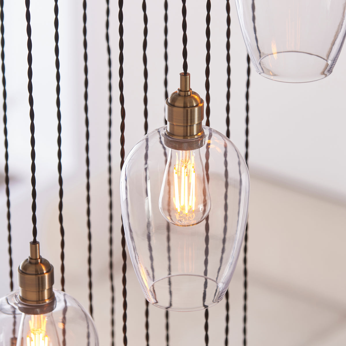 Stourton 13 Light Antique Brass & Clear Glass Cascade Pendant Light