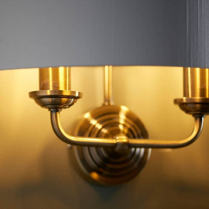 Highclere 2 Light Antique Brass Wall Light with White Shade