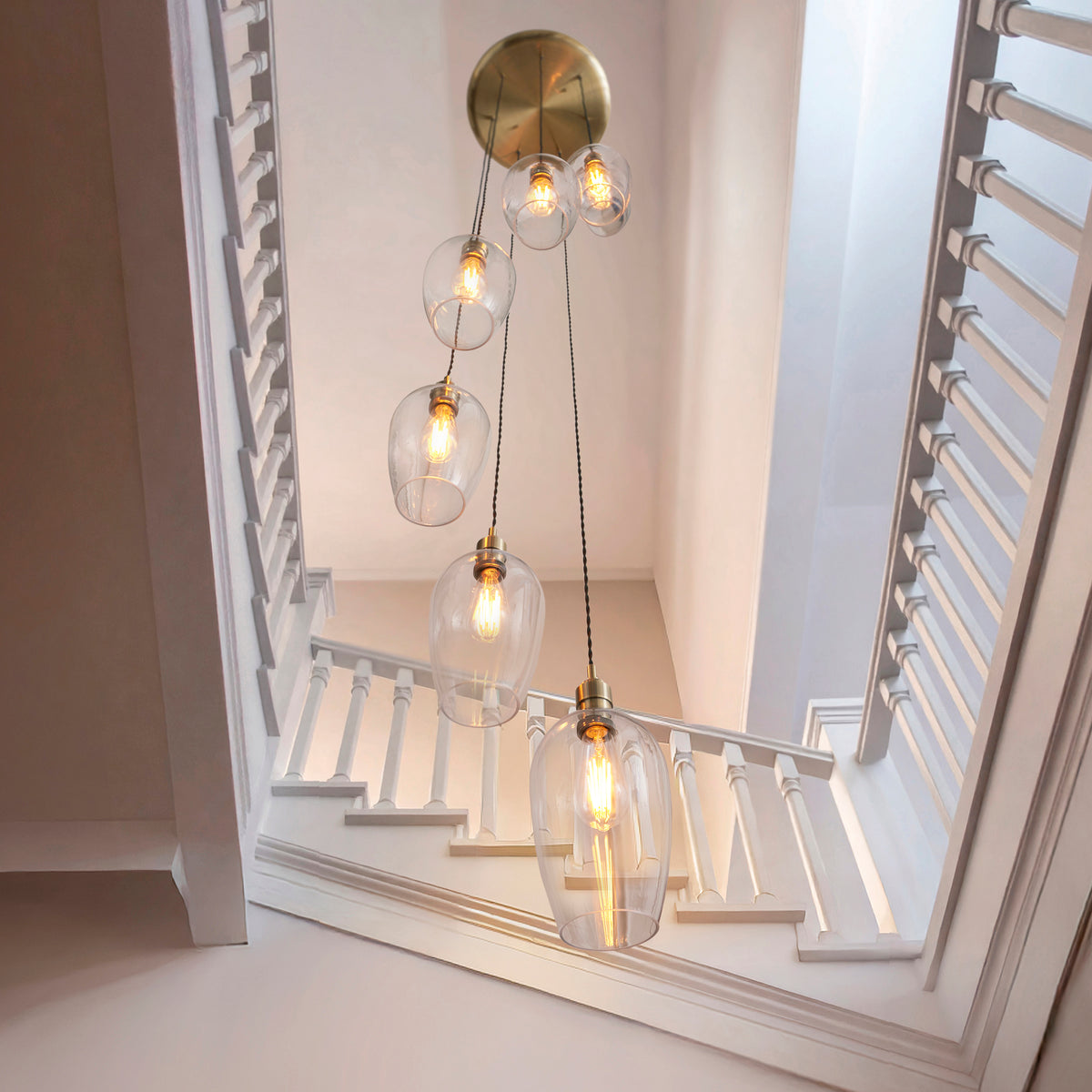 Stourton 7 Light Antique Brass & Clear Glass Cascade Pendant Light