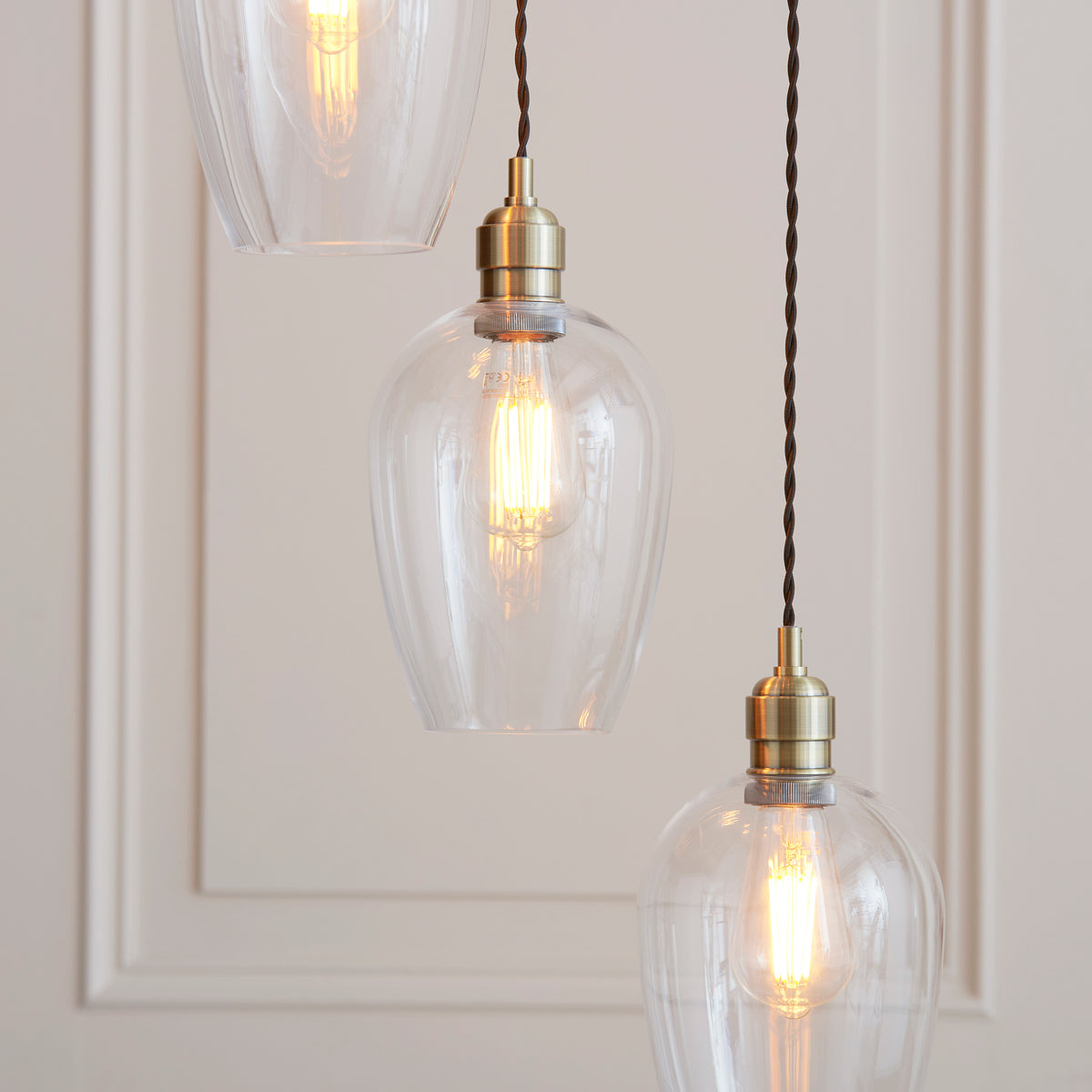 Stourton 7 Light Antique Brass & Clear Glass Cascade Pendant Light