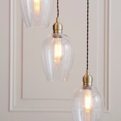 Stourton 7 Light Antique Brass & Clear Glass Cascade Pendant Light