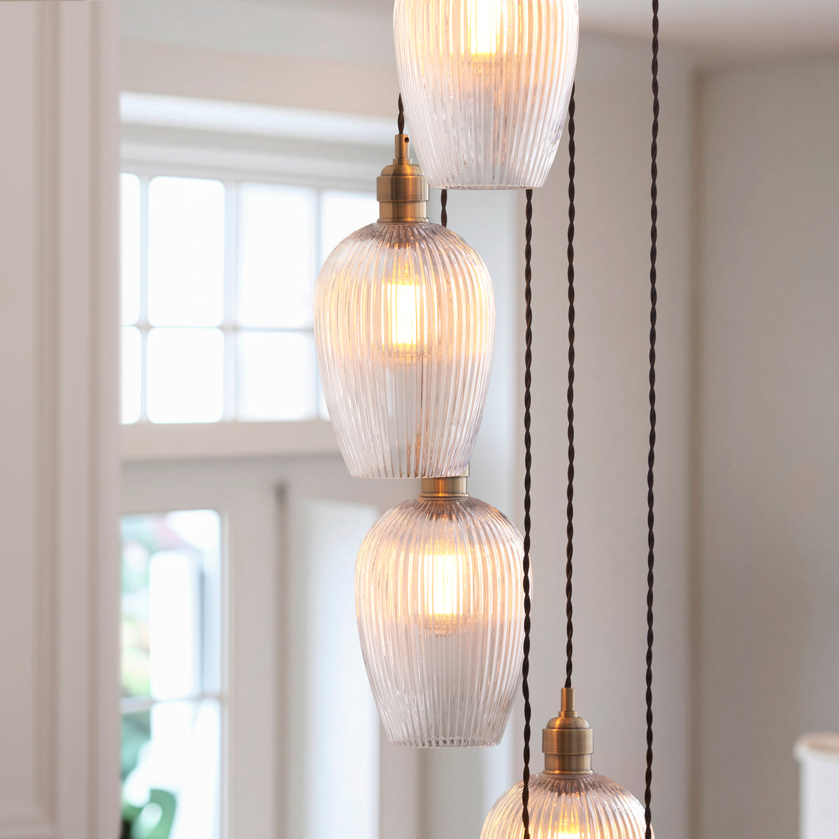 Stourton 13 Light Antique Brass & Ribbed Glass Cascade Pendant Light