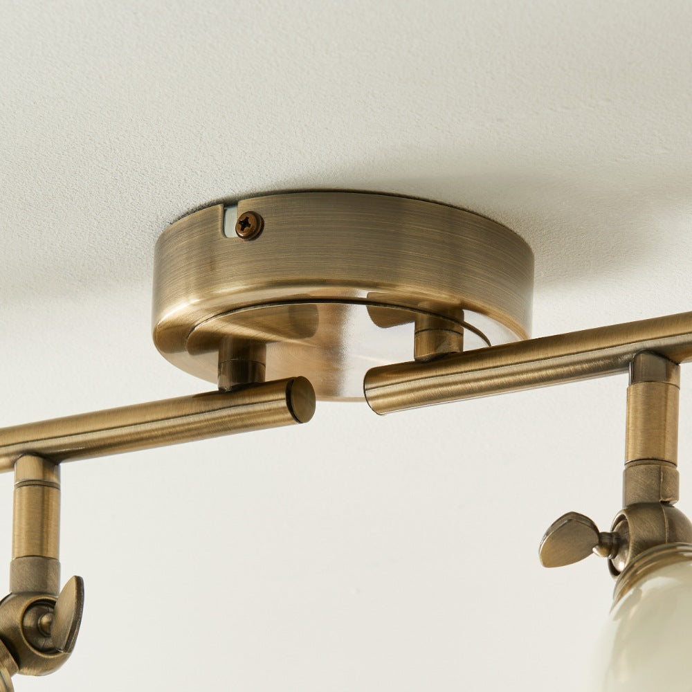 Canford 4-Light Antique Brass Spot Bar