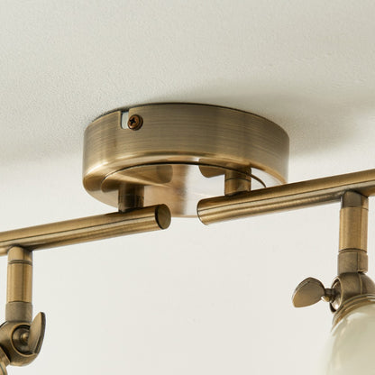 Canford 4-Light Antique Brass Spot Bar